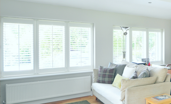 White living room with lots of windows